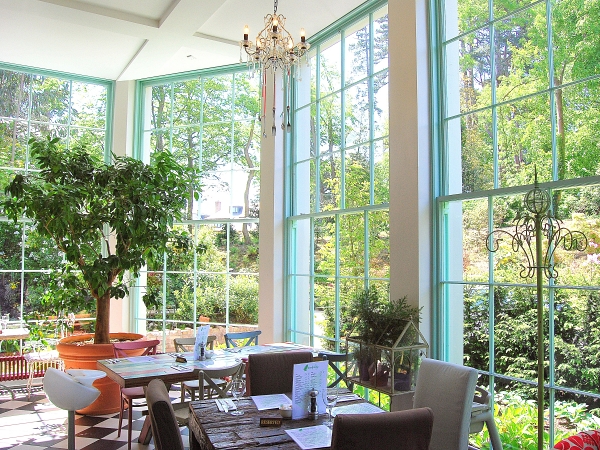 Photograph of the restaurant in Fern House Avoca Handweavers featuring beautiful timber sash windows.